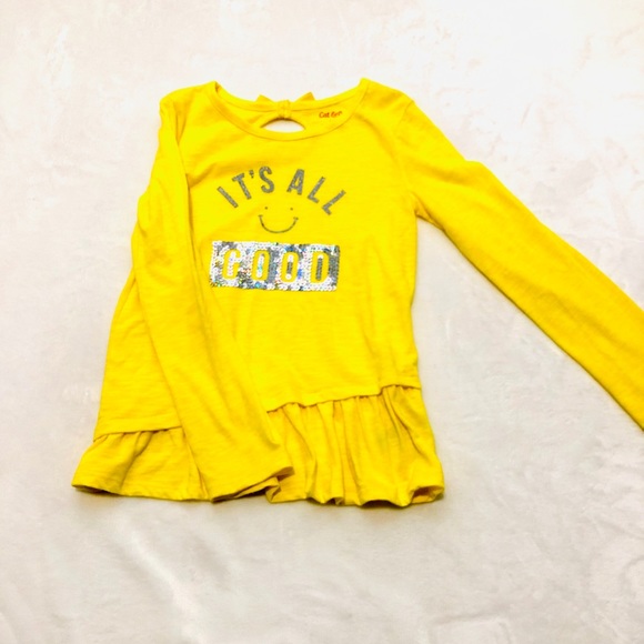 bright yellow long sleeve shirt